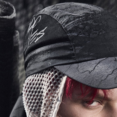 Model in adidas Originals Drop 3 Camp Hat