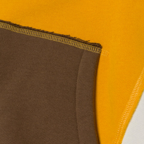 pocket detail on Upcycle Hoodie - Ylw/Crm/Brn