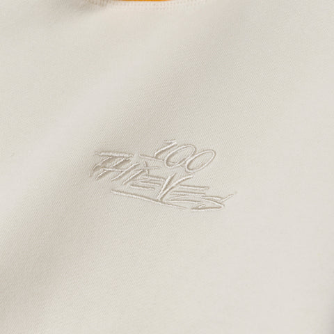 logo on Upcycle Hoodie - Crm/Brn/Ylw