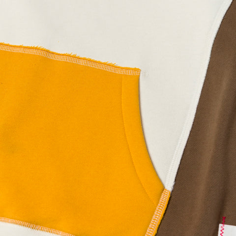 pocket detail on Upcycle Hoodie - Crm/Brn/Ylw