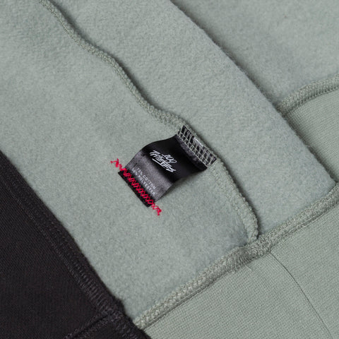 tag detail on Upcycle Crewneck - Blk/Grn