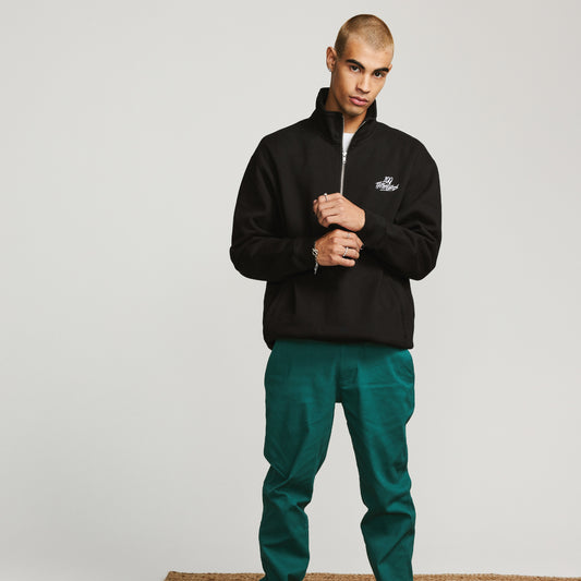 Model wearing a size medium in Foundations FW'23 1/4 Zip Sweatshirt - Black