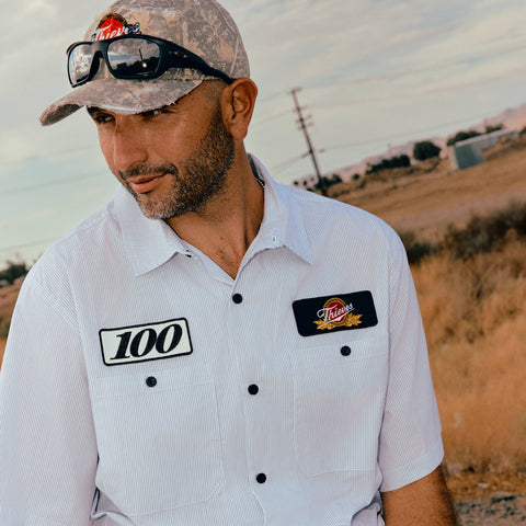Model in Striped Mechanics Shirt.