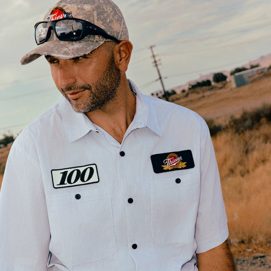 Model in Striped Mechanics Shirt.