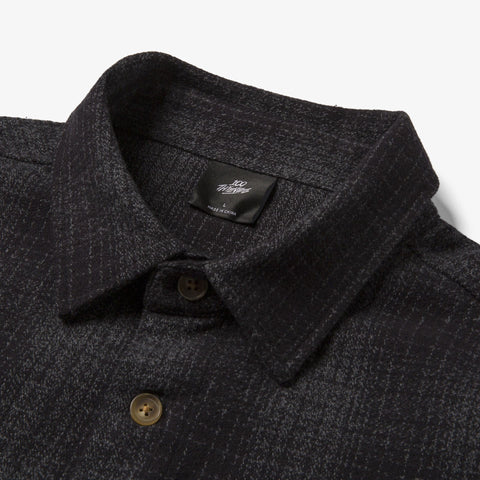 Collar detail of Foundations FW'23 Flannel Overshirt - Black