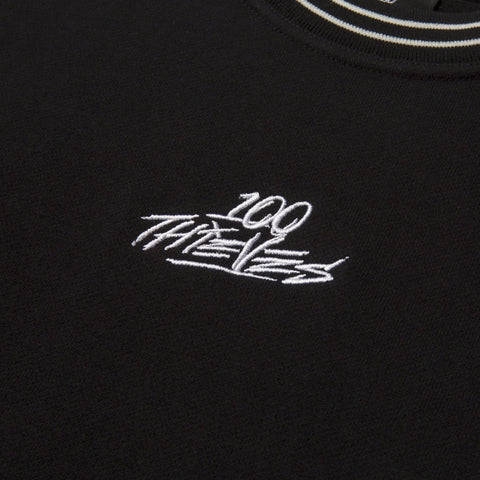 Logo detail of Foundations FW'23 Stripe Crewneck - Black