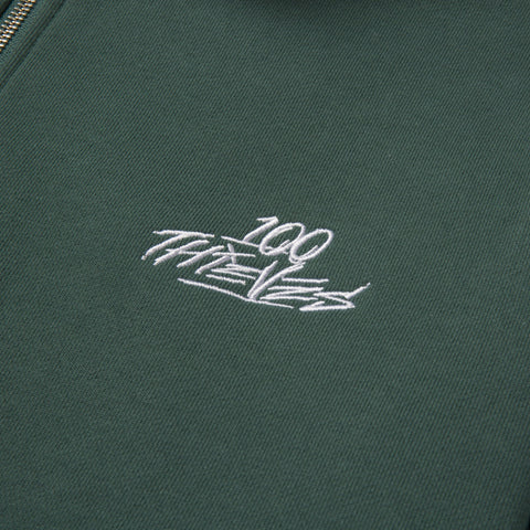 Logo detail on Foundations FW'23 1/4 Zip Sweatshirt - Forest