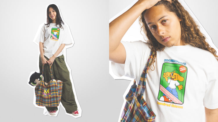 MODEL IN THE Toy Box T-Shirt AND PLAID TOTE BAG