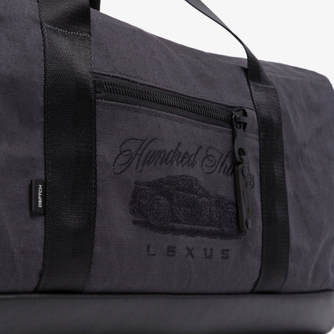 Hundred thieves logo detail on Lexus LFA Weekender Bag