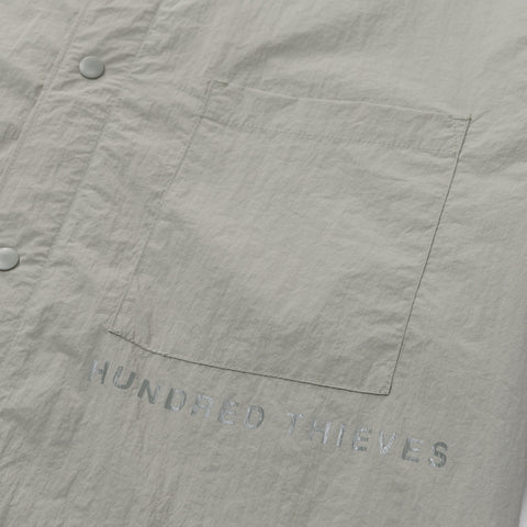 pocket detail on Foundations SS'24 Nylon Shirt - Stonewash Green