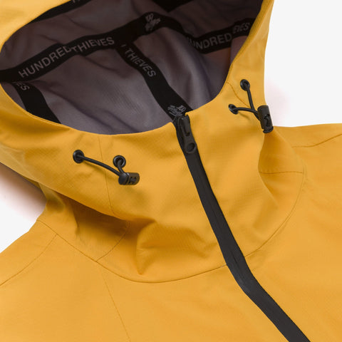 Hood detail on Foundations SS'24 3L Shell Jacket - Gold