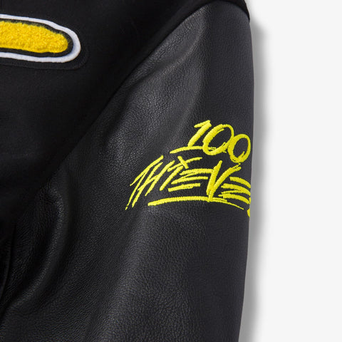 100 Thieves logo on Pikachu Golden Bear Varsity Jacket - Black