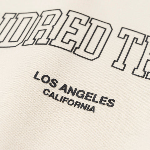 detail on Foundations FW'24 Collared Crewneck - Cream