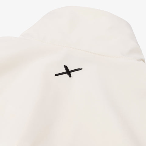 x logo on Foundations FW'24 Women's Windbreaker - Cream