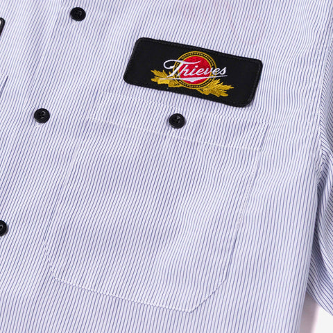 Thieves patch on Striped Mechanics Shirt