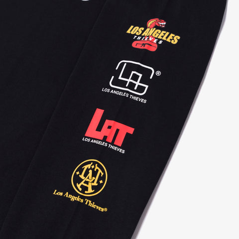 logos on sleeve of Strapped LS T-Shirt - Black