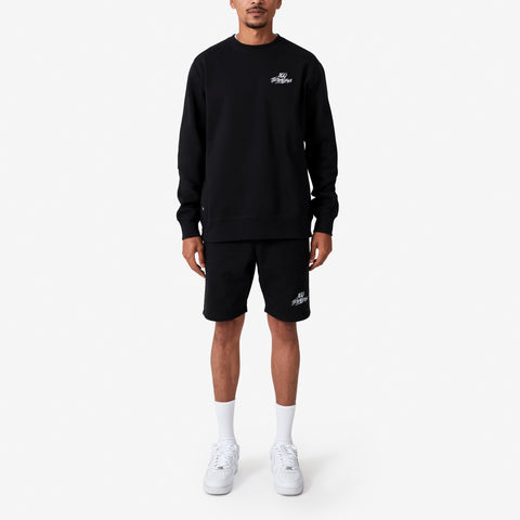 Front of 100 Thieves Foundations heavy-weighted crewneck in black - on 6'1 model