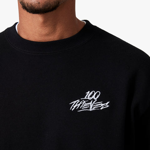 100 Thieves Logo embroidered on left side of 100 Thieves Foundations heavy-weighted crewneck in black