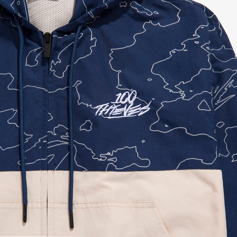 Front of Foundations Geoprint Windbreaker in Bone/Navy